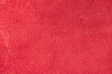 Closeup detail of red leather texture background.