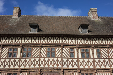 Fototapeta na wymiar The 16th century half-timbered house called Henry IV at Saint-Valery-en-Caux. Saint-Valery-en-Caux - small coastal resort of the Pays de Caux. Saint-Valery-en-Caux, Upper Normandy, France.