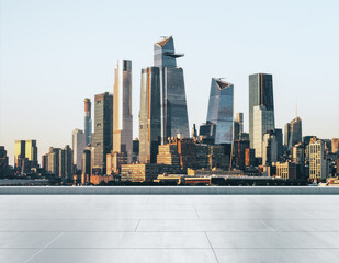 Empty concrete seafront on the background of a beautiful Manhattan city skyline at sunrise, mockup