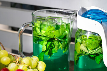 summer refreshing drink in a transparent jug.