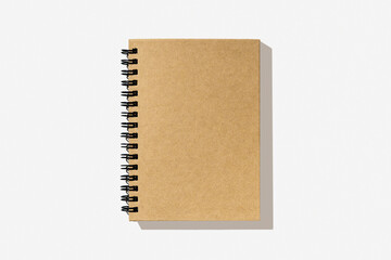 Mockup. Blank paper notebook on white background. Top view with copy space. Office desk table concept.