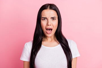 Fototapeta premium Portrait of attractive devastated girl bad terrible news reaction isolated over pink pastel color background