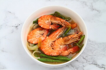 Photo of freshly cooked Filipino food called Sinigang na Hipon or shrimp in tamarind soup.