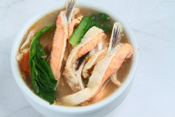 Freshly cooked Filipino food called Sinigang na Salmon or salmon in tamarind soup
