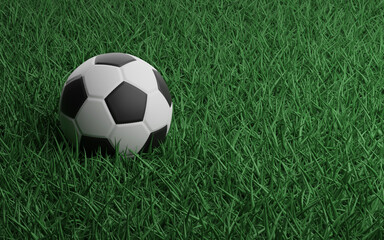 Fototapeta premium Soccer ball on a green grass of football stadium