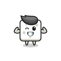 the muscular sugar cube character is posing showing his muscles