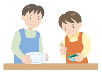 協力して食事の準備をする男女 