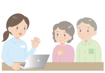 スタッフと高齢夫婦の面談 