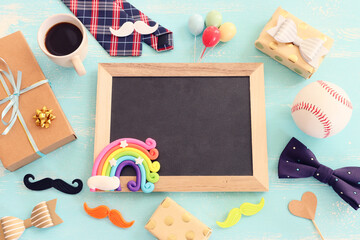 top view image of fathers day composition with vintage father's accessories and blackboard