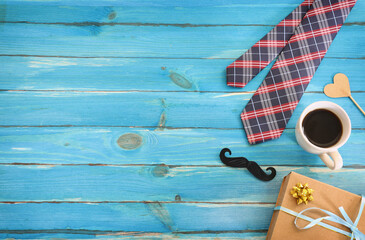 top view image of fathers day composition with vintage father's accessories over blue background