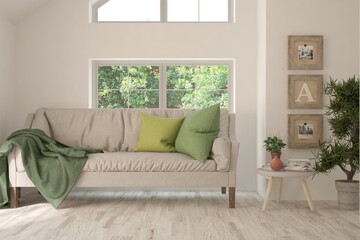 White living room with sofa and summer landscape in window. Scandinavian interior design. 3D illustration