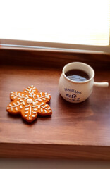 CoffeeGood morning or have a nice day message concept - styling cup of coffee with homemade cookies.