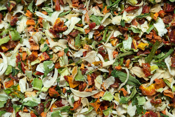 Texture of dried vegetables - close-up view of a mixture of dried vegetables. Top view blur textures soft focus