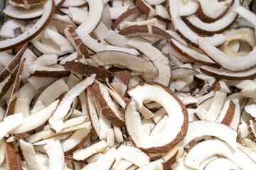 Natural Thin Sliced Coconut Chips Background texture. Top view blur textures soft focus