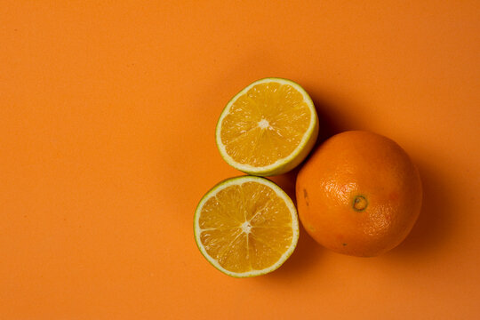 orange fruit on orange summer background