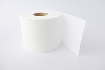 Close-up of toilet paper rolls, tissue paper, household products isolated on white background