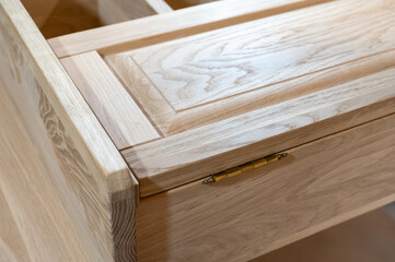 cabinet is handmade from natural wood in light colors. Production of custom-made furniture