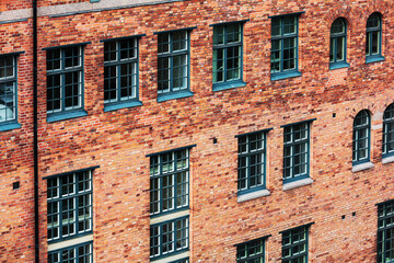 old brick office building with windows