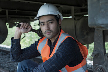 Fototapeta premium portrait worker with hand hold wench.