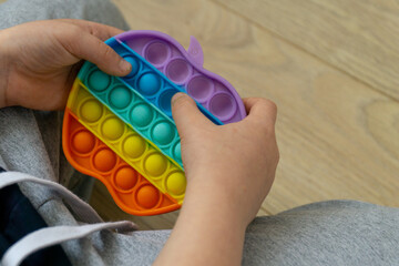 Silicone toy antistress pop it. New trend. Colorful sensors toy.