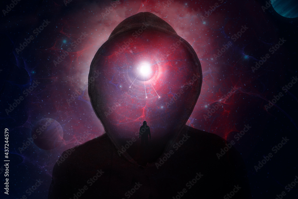 Wall mural a science fiction concept of a hooded figure without a face. over layered with a man looking into a 