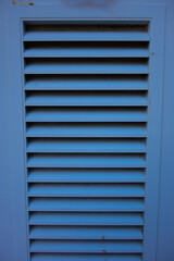grey blue wooden louvers slightly dirty