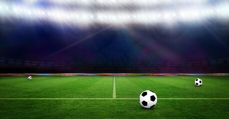Fototapeta na wymiar Composition of three footballs on football pitch with spotlights in sports stadium