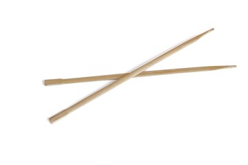 Wooden sticks, top view of stacked two wooden sticks on isolated white background.
