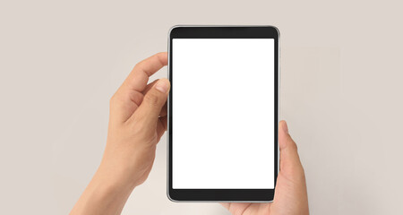 Hands holding tablet touch computer gadget
