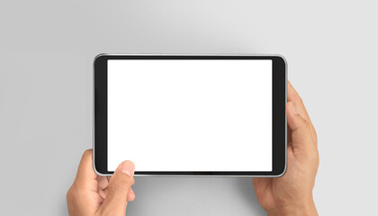 Hands holding tablet touch computer gadget