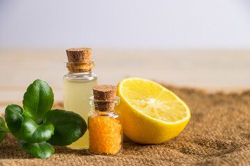 Product for spa and aromatherapy. Health care concept. Organic cosmetics with yellow lemon.