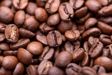 Roasted coffee beans. Background and macro