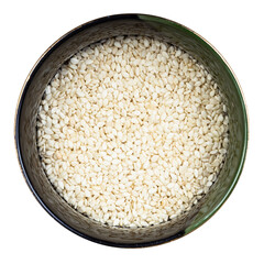 white sesame seeds in round bowl isolated