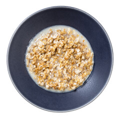 cooked porridge from wholegrain oat in gray bowl