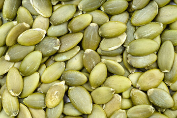 background - many hulled pumpkin seeds