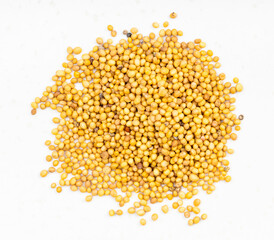 pile of yellow seeds of brassica juncea mustard