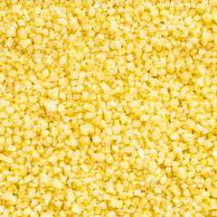 uncooked moroccan couscous groats close up