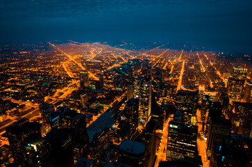 Fototapeta premium Chicago, Illinois, USA - Aerial view of Chicago downtown skyline at night, USA