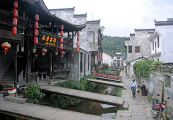 Fototapeta premium Xiao Likeng in Wuyuan County, Jiangxi Province, China. Xiao Likeng is an ancient town in Wuyuan County known for its Tang Dynasty architecture and small waterways.