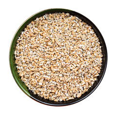 crushed rye groats in round bowl isolated