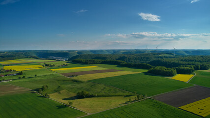 Naklejka premium landscape with field and blue sky. aerial view