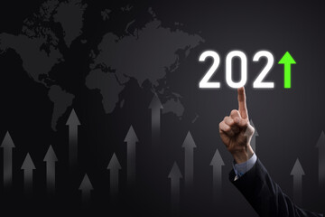 Plan business positive growth in year 2021 concept. Businessman plan and increase of positive indicators in his business, Growing up business concepts.