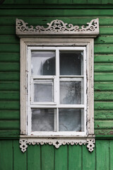Window in white decorative frame