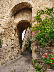 Stone gate of the medieval village of Cordes-sur-Ciel, France.