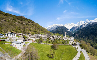 Fototapeta na wymiar Panorama aerial image of the Swiss mountain village Soglio. It was creadited as one the most beautiful village in Switzerland.