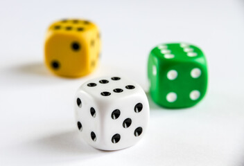 Three colorful dices isolated on white background