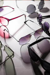 different glasses. color sun glasses. minimal concept photo 