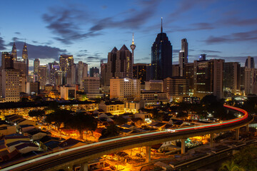 Fototapeta premium Kuala Lumpur,Malaysia ,May circa 2021: A magnificent view of kuala lumpur skyline during sunrise