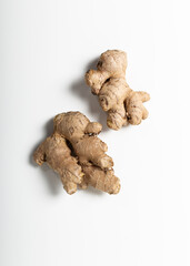 Fresh ginger on white background.