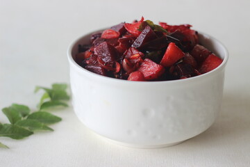 Stir fried beetroot and potato cubes with shallots, dry red chillies and curry leaves. A side dish for Kerala meals